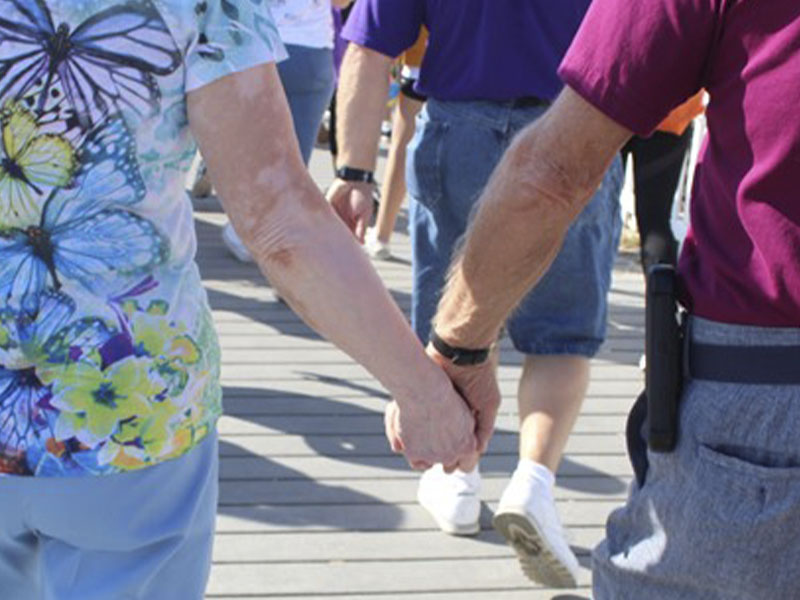 impact-holding-hands