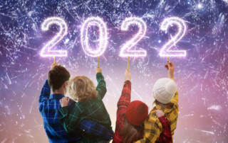 Happy new year. Family watching fireworks.