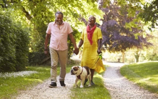 Couple Walking Dog